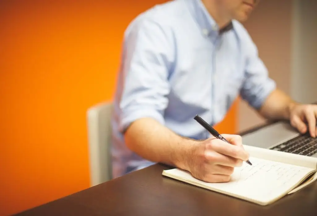 Man Working On laptop In Office