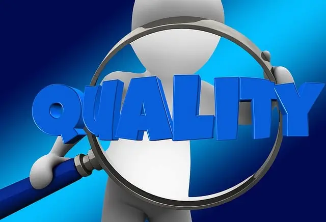 Magnifying glass examining a quality graphic