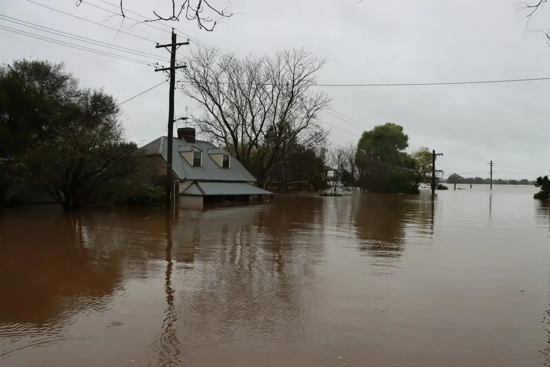 Floodwater surrounding a house in Windsor, Australia