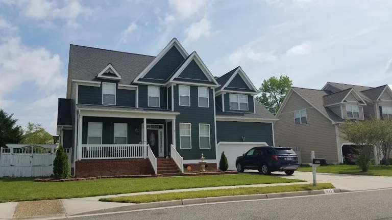 Gray two-story home with a covered front porch