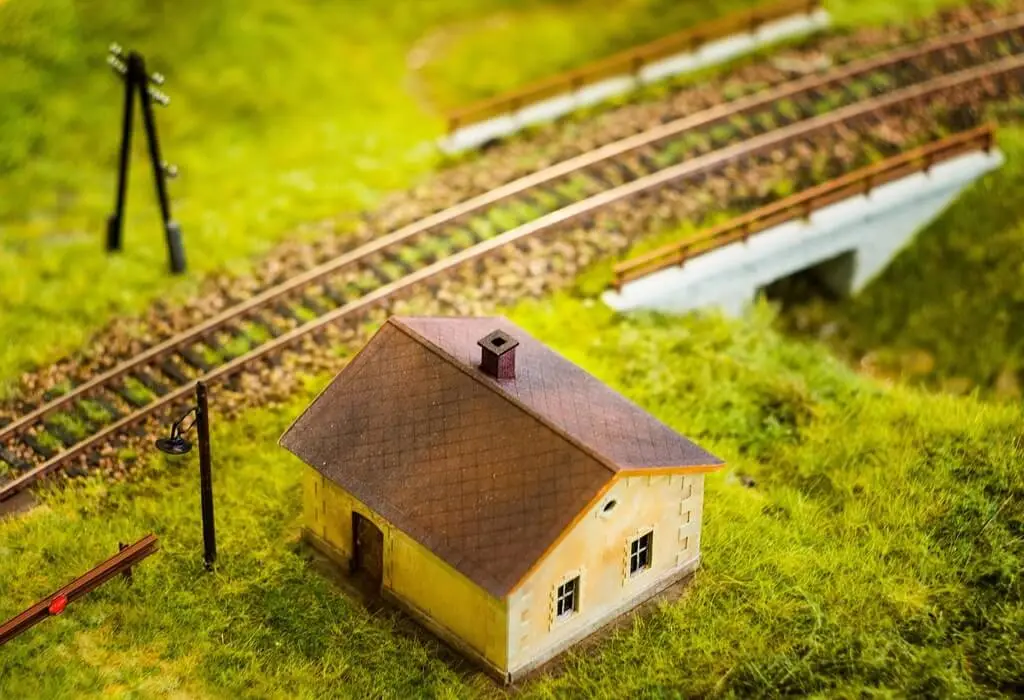 Train beside a residential area